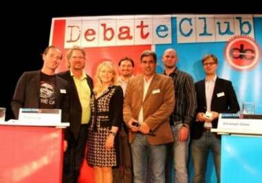 The evening's debaters and host at Schwabing's TamS Theater